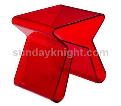 Transparent red acrylic coffee table