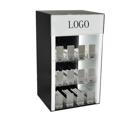 Beleuchtete Acrylvitrine mit Federstößel