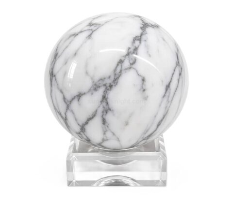 Espositore personalizzato in acrilico trasparente a forma di sfera con pietre di marmo